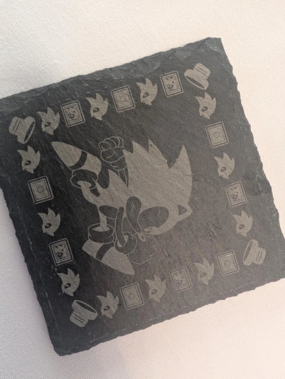 Laser engraved slate coaster with cartoon character design and geometric border