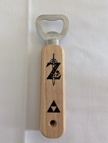 Wood handle bottle opener with sword and triangle symbols, engraved on light wood