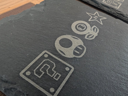 Engraved slate coaster with retro gaming icons, custom metal wood acrylic home decor