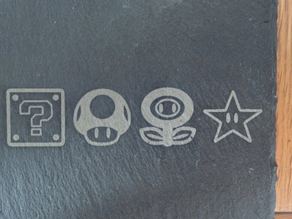 Engraved slate with four classic video game icons, custom gift, gamer decor