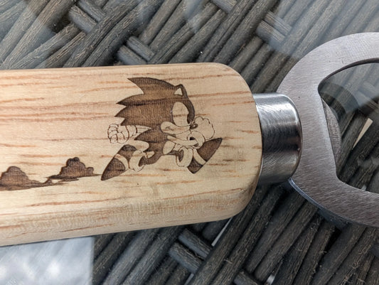 Custom wood bottle opener with engraved cartoon character and stainless steel head