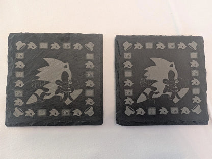 Set of two engraved slate coasters with running cartoon hedgehog design, custom made
